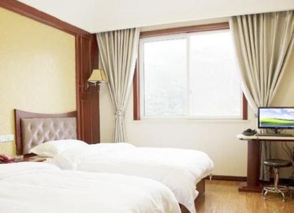 Xingzhou Hotel Leshan Room photo