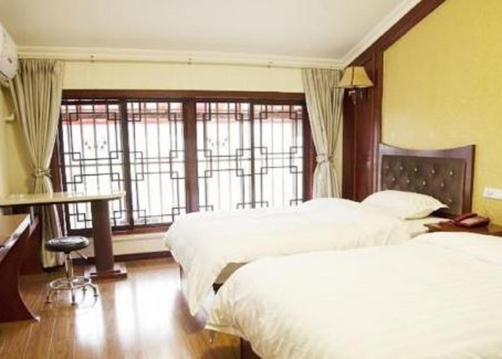 Xingzhou Hotel Leshan Room photo